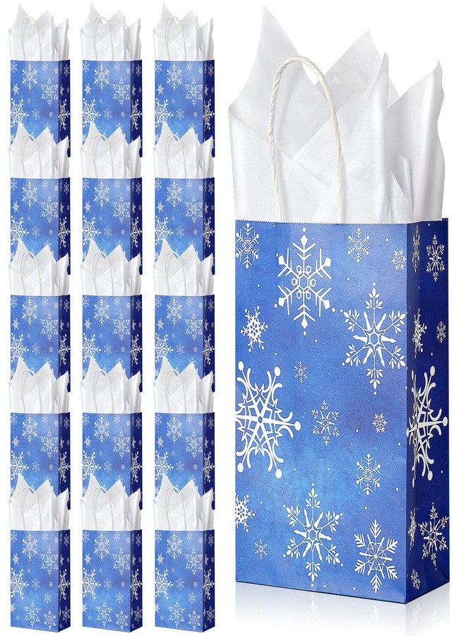 Jectivs 16Pcs Christmas Snowflake Party Gift Bags Winter Onederland Blue Treat Bags with 16Pcs White Tissue, Large Thick Kraft Paper Christmas Goodie Bag with Handles for Holiday Party Favor - Image 1